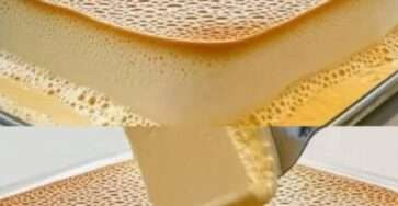 Tranche de flan maison moelleux, doré et lisse, servie sur une assiette avec cuillère