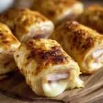 mini croque-monsieur roulés dorés, servis en apéritif