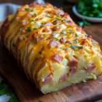 Pain de pommes de terre farci au jambon et au fromage doré et fondant