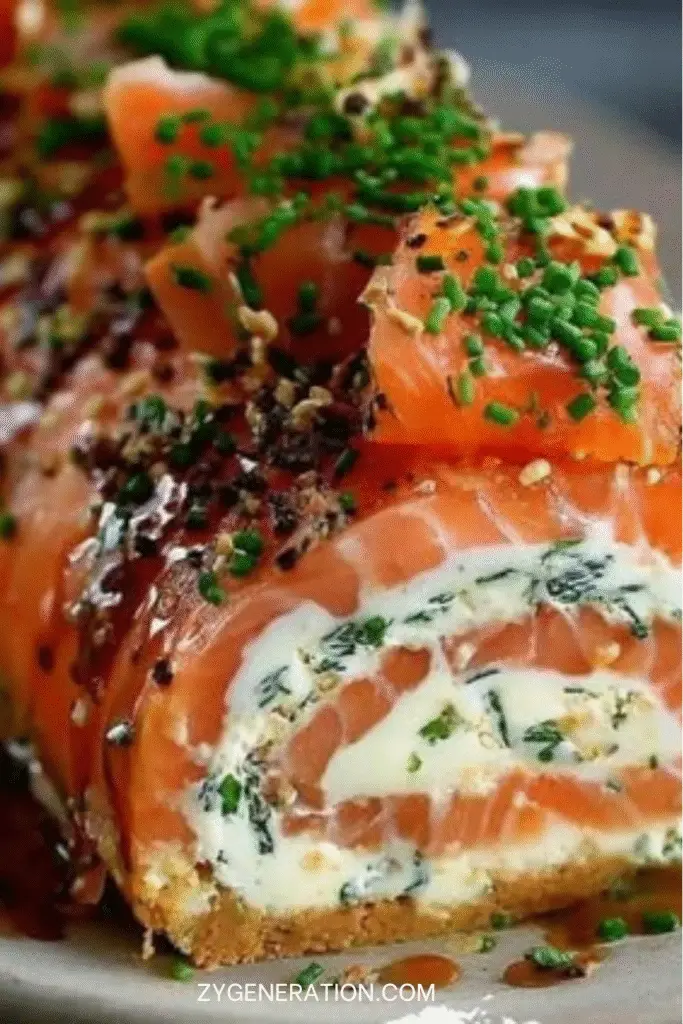 bûche salée au saumon fumé et fromage frais décorée d’aneth et œufs de saumon